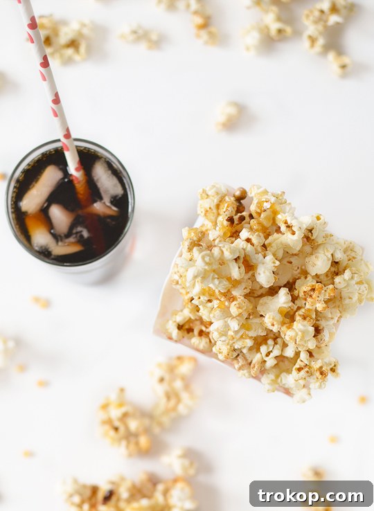 A close-up of Pumpkin Spice Kettle Corn in a large white bowl, ready for sharing.