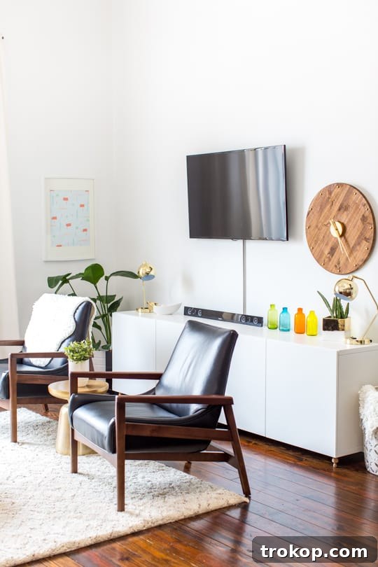 Apartment Living Room Reimagined 9 Mid-century modern DIY wall clock adding a unique touch to the living room beside the television