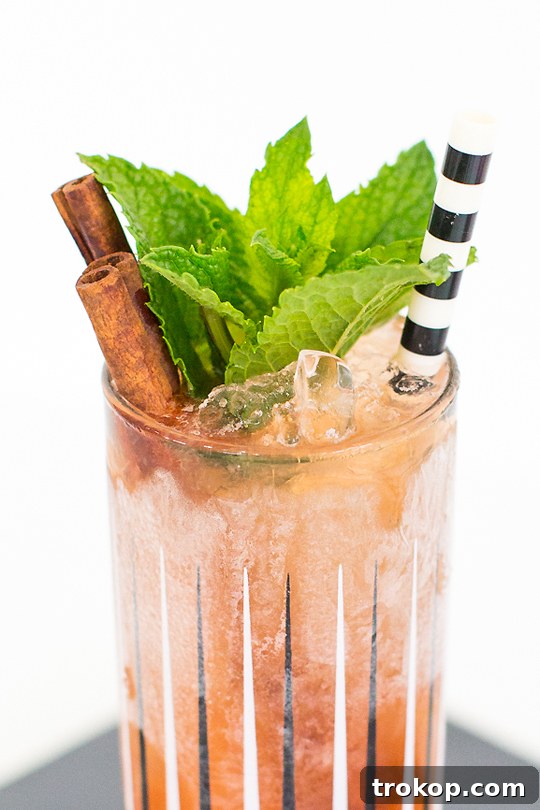 A frosty, blended Zombie cocktail served in a tall glass with crushed ice, ready for tropical enjoyment.