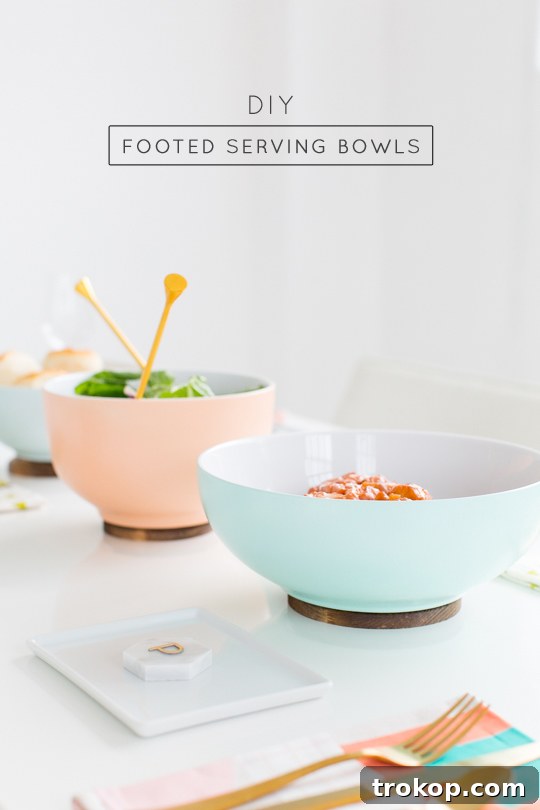 Two DIY Footed Serving Bowls on a rustic wooden surface, showcasing their elegant design and craftsmanship.