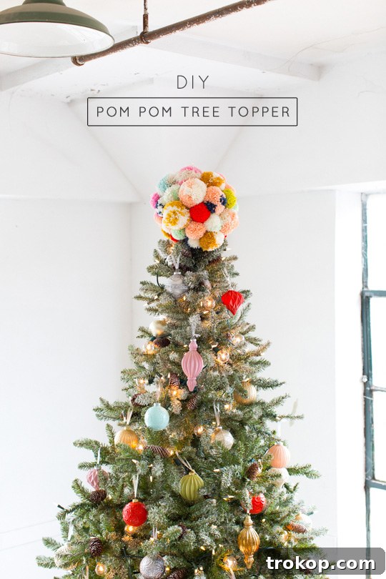 Martha Stewart's Holiday Crafting: Signature Tree Toppers & DIY Ornaments 4 Decorated Christmas tree with pom pom topper and wrapped gifts in a cozy holiday nook