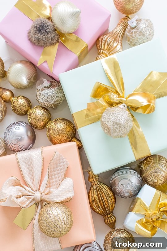 Martha Stewart's Holiday Crafting: Signature Tree Toppers & DIY Ornaments 5 Stylishly arranged Martha Stewart Christmas ornaments on a tree branch