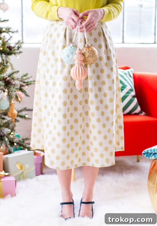 Martha Stewart's Holiday Crafting: Signature Tree Toppers & DIY Ornaments 9 A collection of colorful and elegant Martha Stewart ornaments with custom spray paint accents