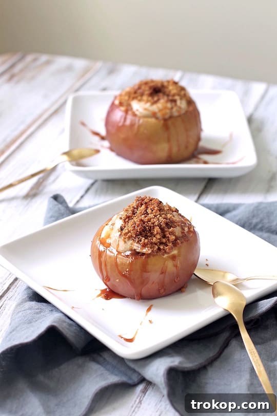 Decadent Cheesecake Stuffed Apples 3 Close-up of baked apple cheesecake dessert with caramel topping