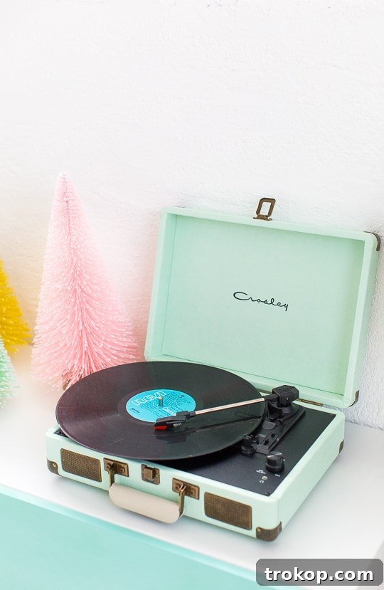 4 Fresh Holiday Traditions to Elevate Your Season 8 Family dancing together at a retro-themed Christmas Eve party