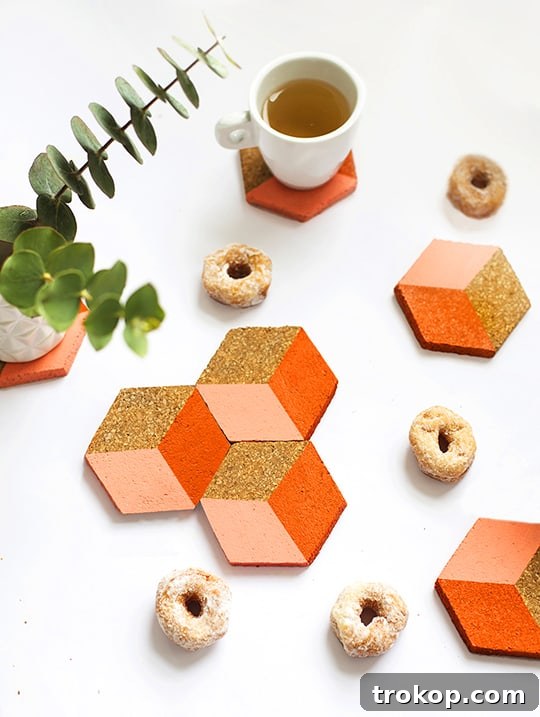 Overhead view of geometric cork coasters on a table