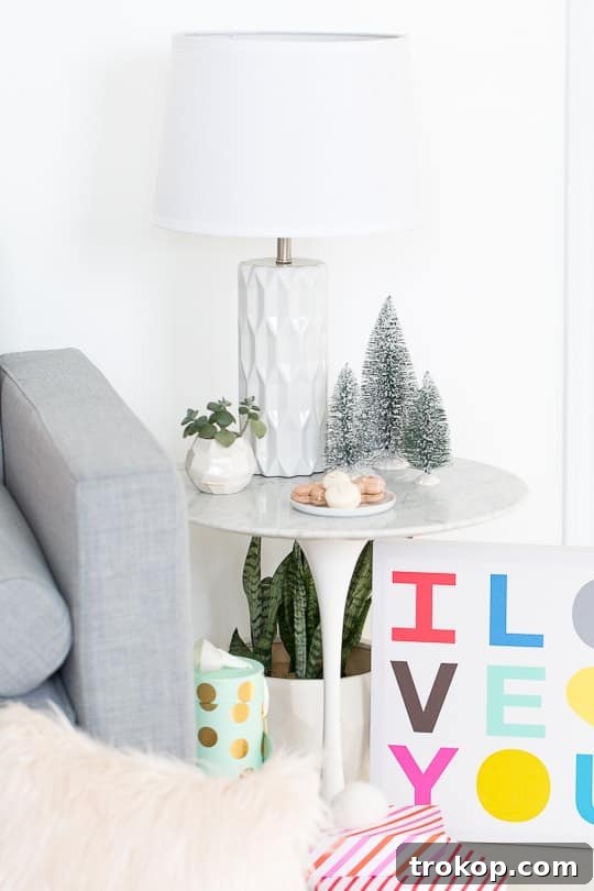 A chic studio living area featuring a new sofa and coffee table, all sourced affordably from Walmart.com.
