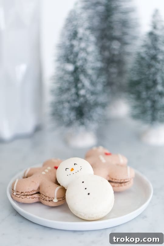 A beautifully styled Christmas tree with unique candy ribbon garland and gold ornaments, showcasing creative holiday decor.