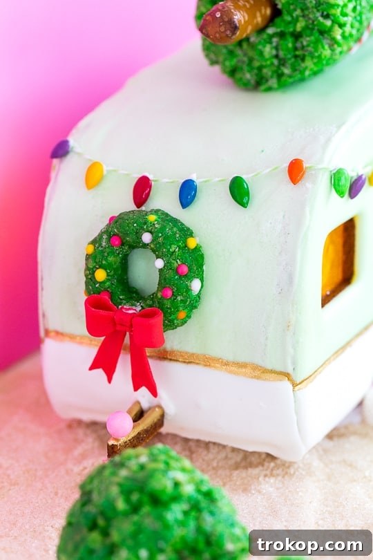 Decorating flat gingerbread camper walls before assembly