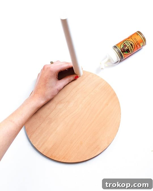 Attaching the painted legs to the patterned side table top