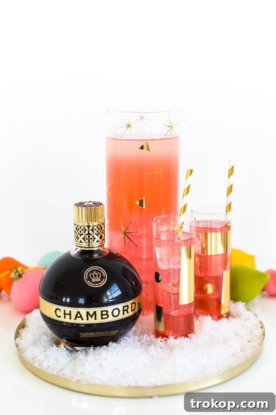 Stunning DIY metallic patterned glassware crafted with gold vinyl, perfect for cocktails and entertaining.