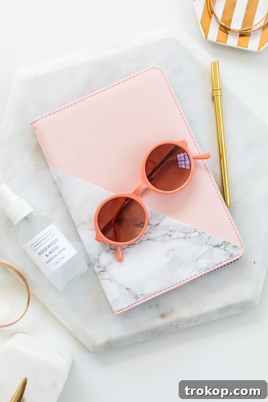 DIY Tablet and E-Reader Cosies 2 Stylish DIY Kindle or Tablet Cover with a chic marble design, perfect for personalizing your e-reader