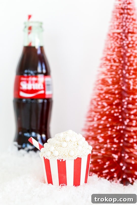 Old-Fashioned Coca-Cola Cupcakes 14 A selection of Classic Coca-Cola Cupcakes with different festive decorations