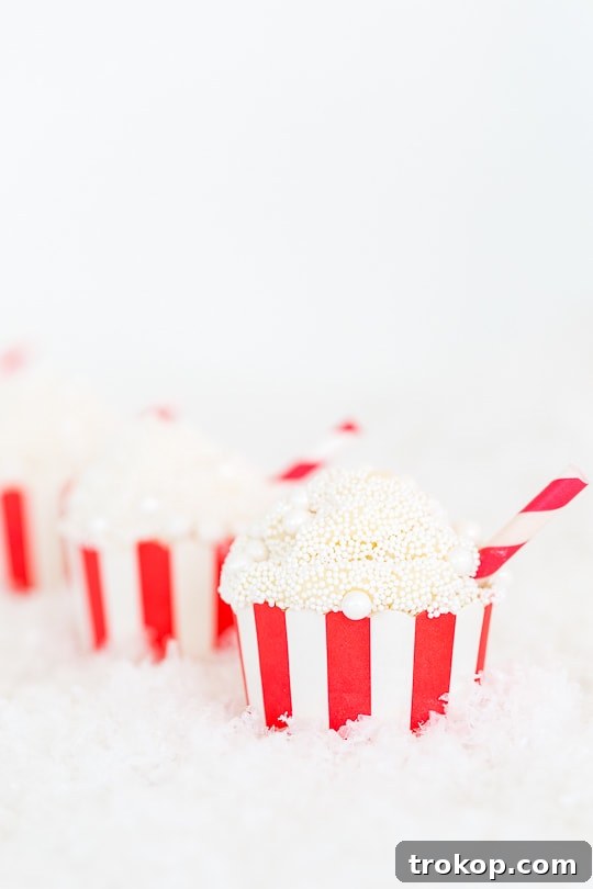 Old-Fashioned Coca-Cola Cupcakes 3 Close-up of a perfectly decorated Classic Coca-Cola Cupcake ready to be enjoyed
