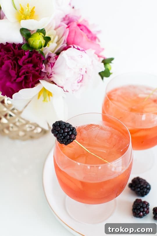 3-Ingredient Blackberry Champagne Fizz 10 Blackberry Champagne Punch in a punch bowl, ready to serve