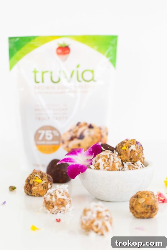 Various customized no-bake peanut butter energy balls with different toppings
