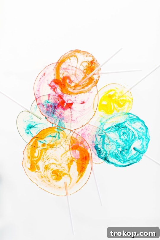 Step 5 -DIY Marble Spiked Lollipops by Sugar & Cloth Top Houston Lifestyle Blogger Ashley Rose #lollipops #diy #recipe #marble #spiked #tequila #alcohol #adult #candy #sweets