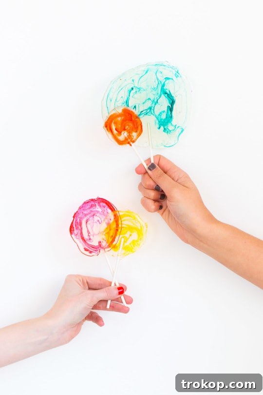 Step 6 -DIY Marble Spiked Lollipops by Sugar & Cloth Top Houston Lifestyle Blogger Ashley Rose #lollipops #diy #recipe #marble #spiked #tequila #alcohol #adult #candy #sweets
