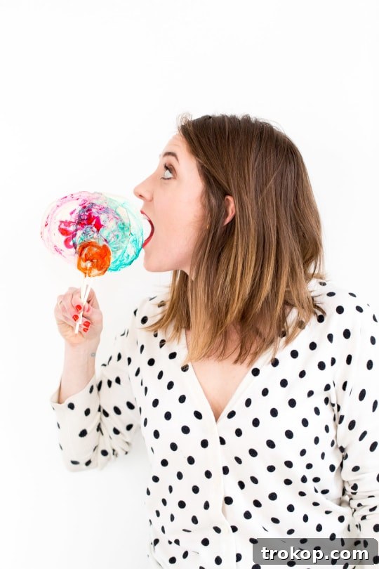 DIY Marble Spiked Lollipops by Sugar & Cloth Top Houston Lifestyle Blogger Ashley Rose #lollipops #diy #recipe #marble #spiked #tequila #alcohol #adult #candy #sweets
