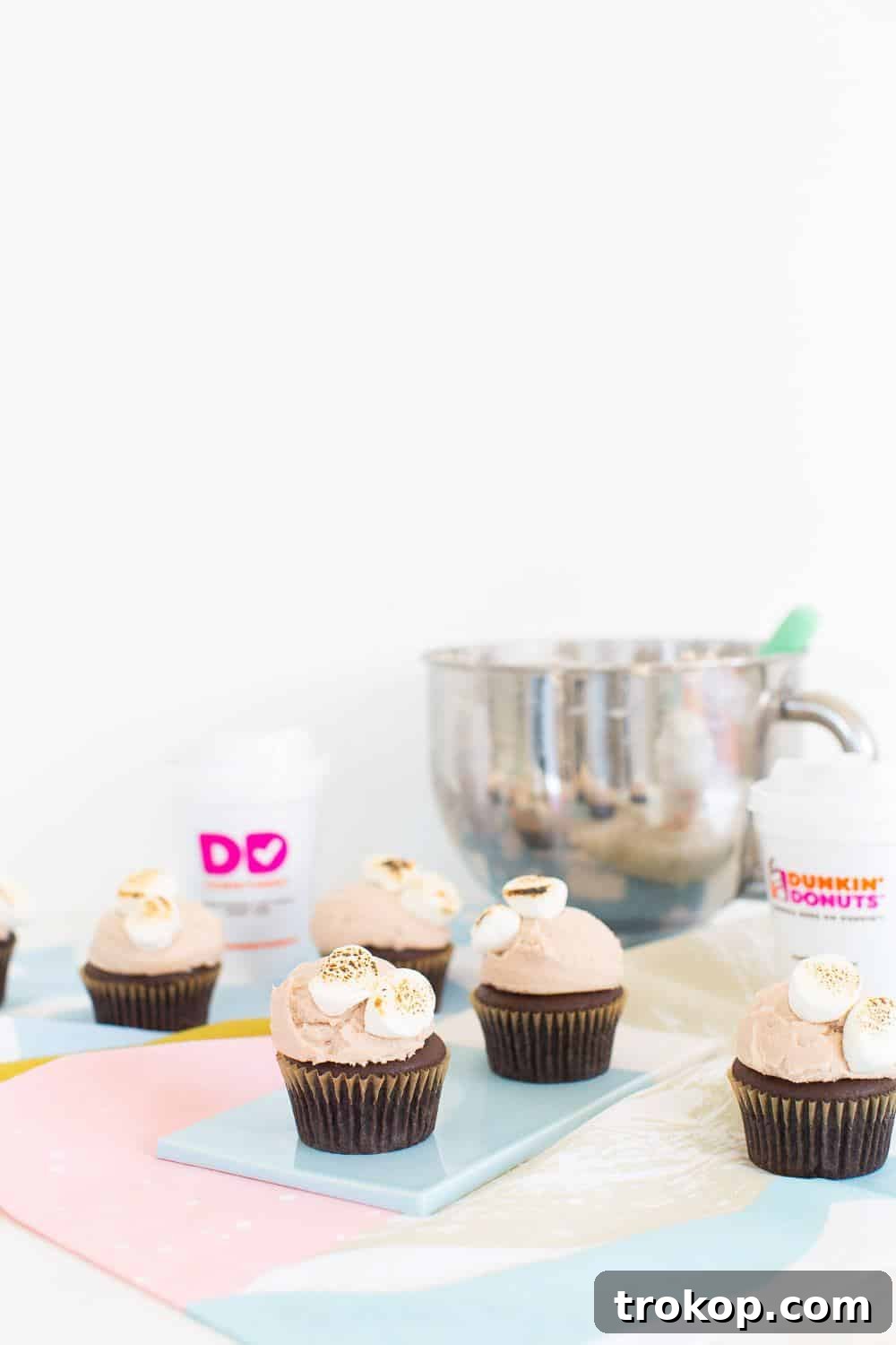 Rich Dunkin' Donuts Hot Chocolate Frosting on a Chocolate Cupcake, topped with toasted marshmallows.
