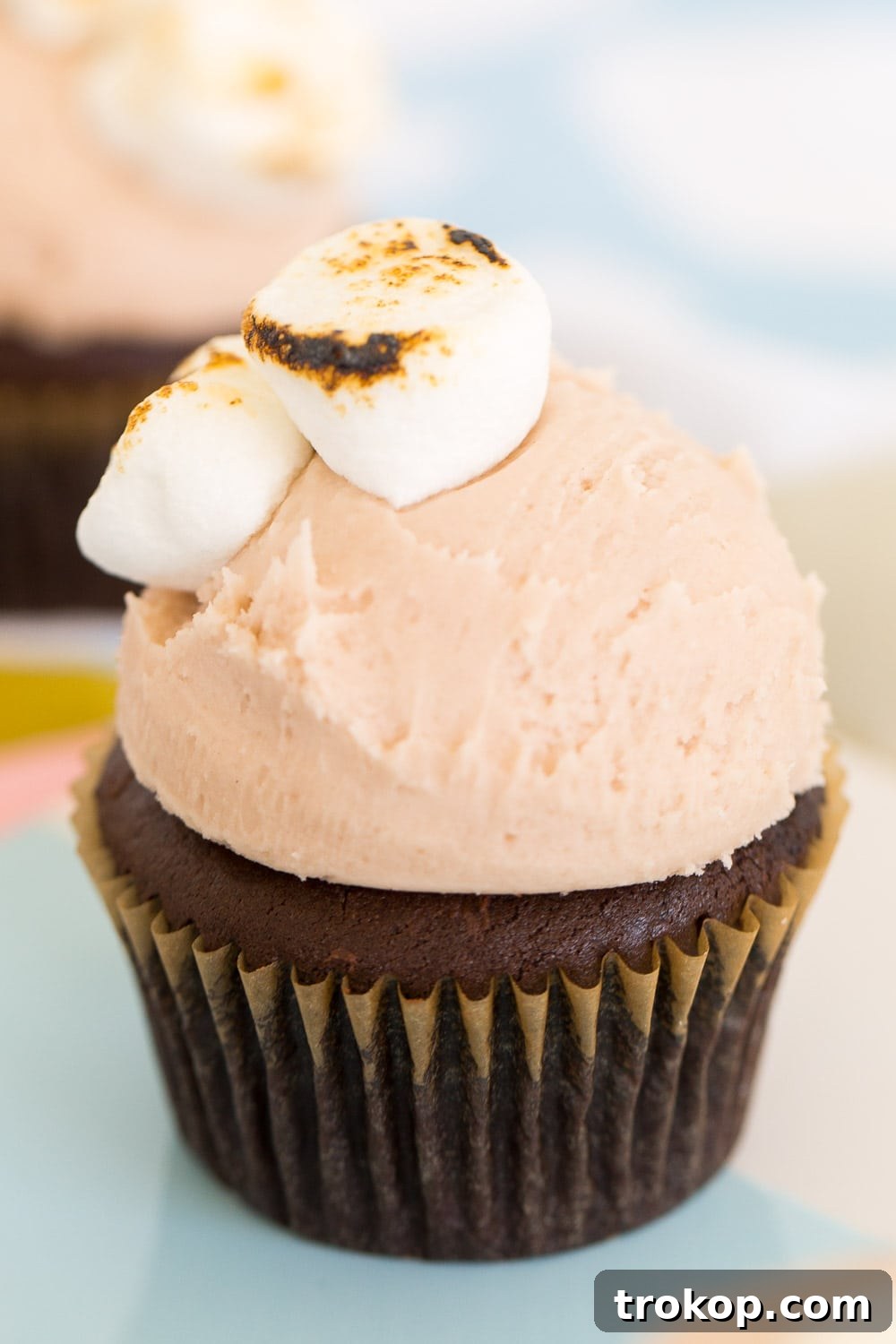 A closer look at the texture and inviting appearance of a single Dunkin' Donuts hot chocolate cupcake.