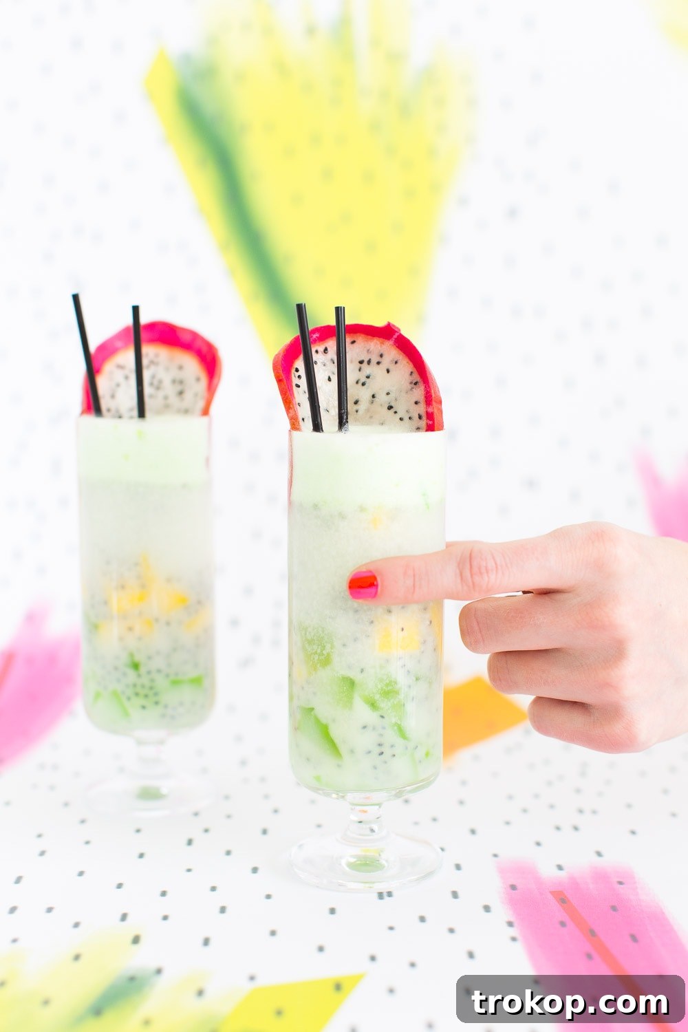 Tropical Thai Fruit Cocktail Recipe 10 Patter Play: A striking top-down view of the Dotted Thai Fruit Cocktail, showcasing the intricate basil seed pattern and the vibrant, refreshing aesthetic of the drink.