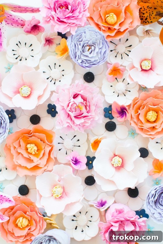 A close-up shot of a DIY sugar flower cake, highlighting the intricate details of the edible flowers.