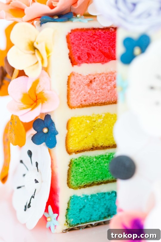 A DIY sugar flower cake in an elegant spring setting.