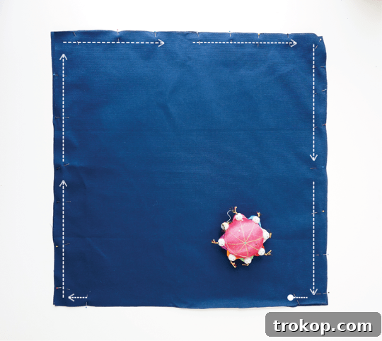 Image showcasing all the materials and tools needed for the DIY tufted pillow project