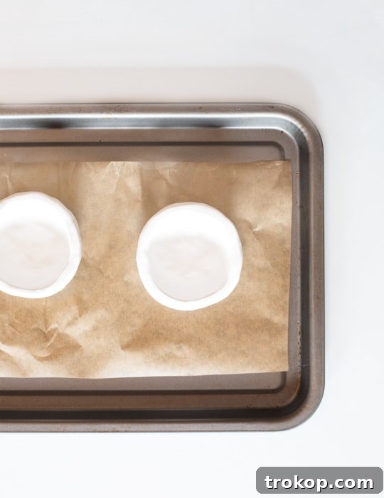 Baked polymer clay pot cooling on a lined baking tray