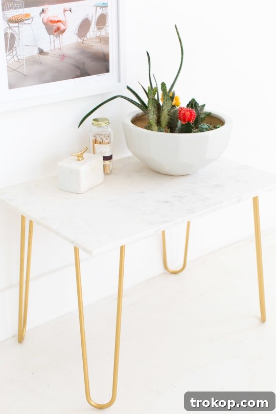 Golden Touch DIY Marble Tabletop 4 Finished gold accent table with a sleek marble top, showcasing elegant home decor. A perfect DIY project for stylish spaces.