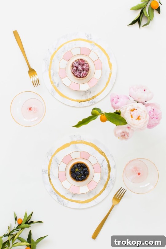 DIY Chic Marbled Plates 12 Two DIY marble plates with gold accents on a marble surface