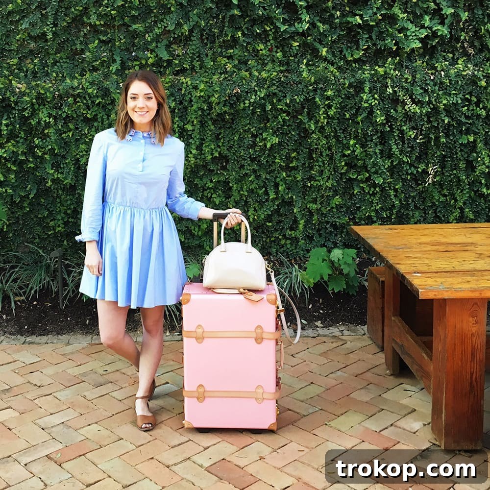 Beyond the Lens: Latest Insights 2/26 6 Ashley Rose with New Pink Luggage - Austin Travel Style