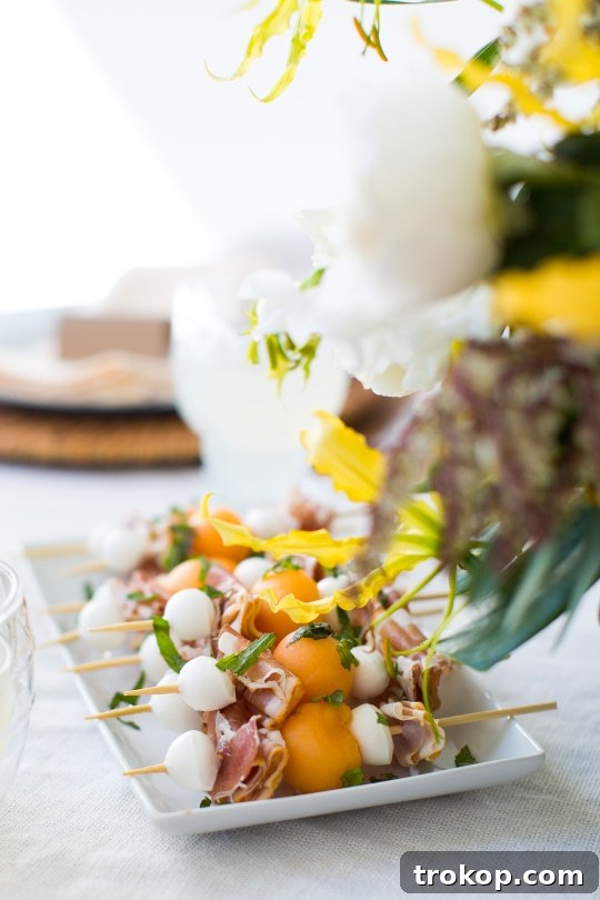 Kendin Yap Peçetelerle Modern Bahar Sofraları 7 Elegant spring tablescape with vibrant floral arrangements