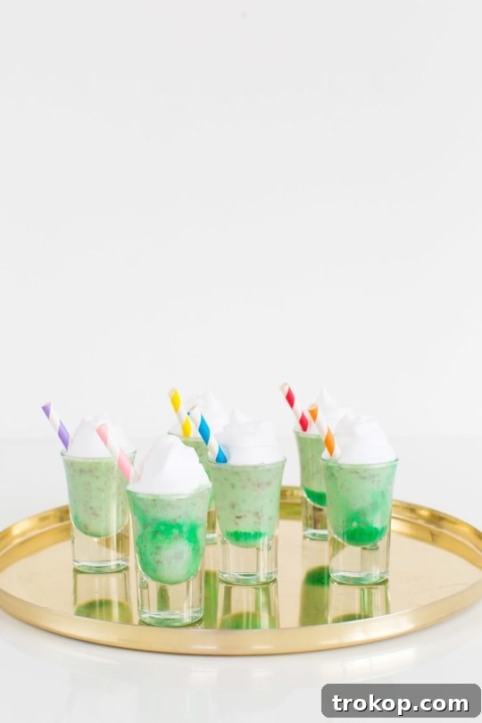 A collection of Creme de Menthe Ice Cream Shots, beautifully arranged on a tray, ready for a gathering.