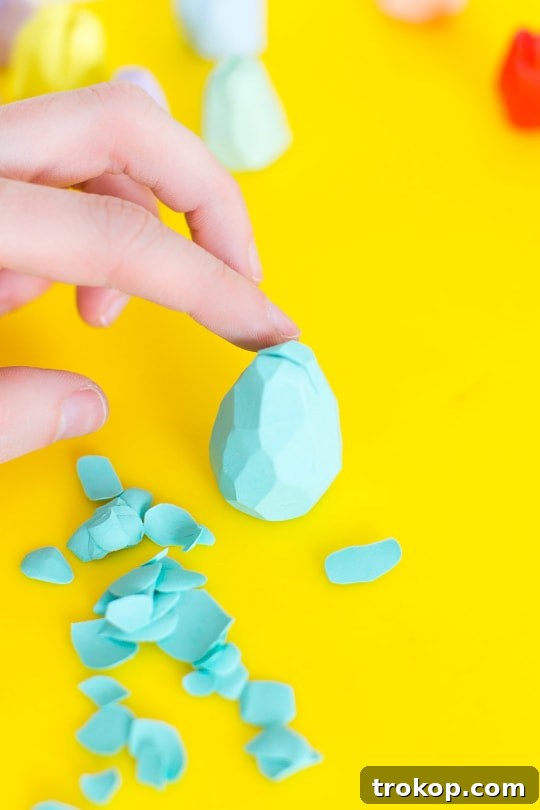 Close-up of faceted polymer clay eggs awaiting baking.