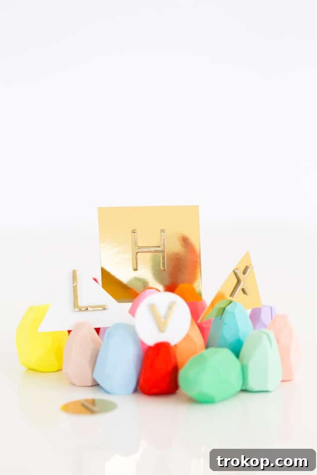 Finished faceted Easter egg place card holders beautifully displayed on a table setting.