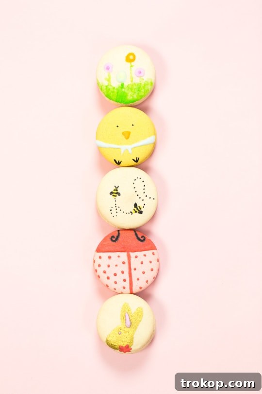 Close-up of a decorated Easter macaron next to Lindt chocolates