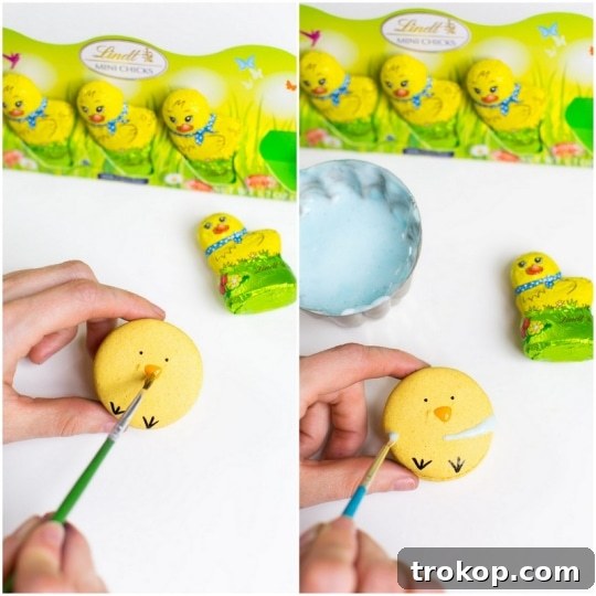 Macarons decorated with flower designs using paintable royal icing