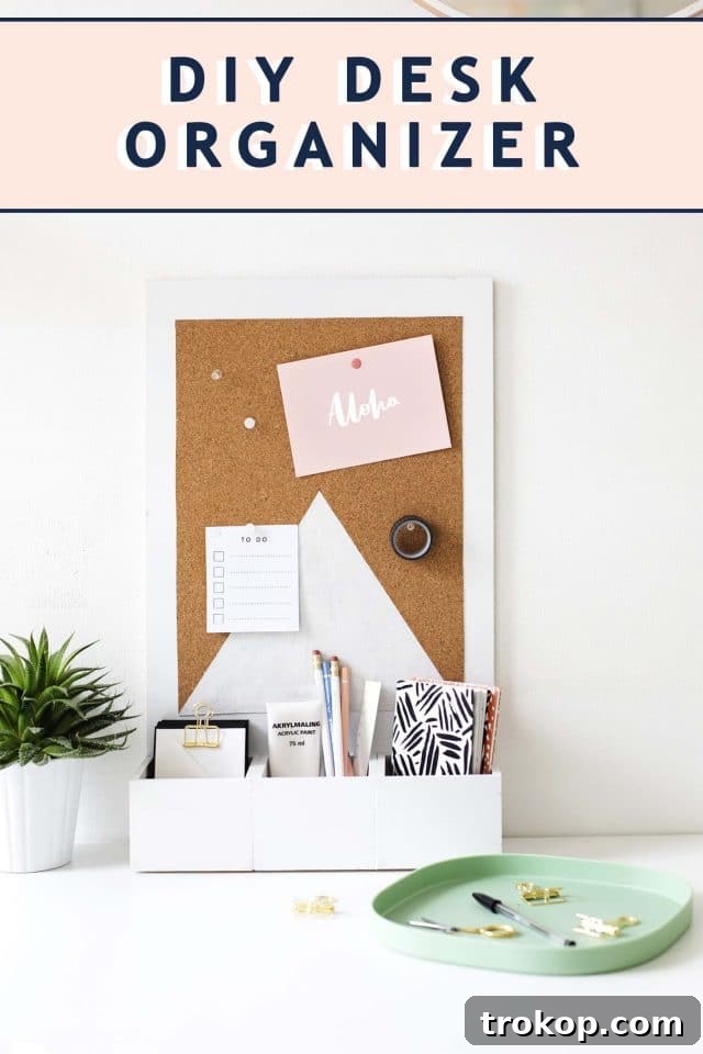 Craft Your Custom Desk Organizer 12 Overhead view of a DIY desk organizer with a bulletin board, displaying neatly arranged office supplies and a modern design.
