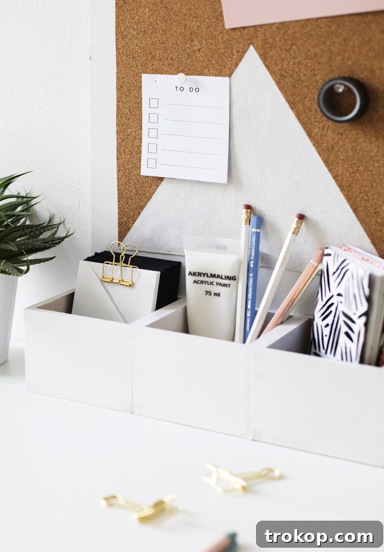 Craft Your Custom Desk Organizer 3 A stylish and practical DIY desk organizer with a cork board, perfect for spring cleaning and enhancing your home office decor.