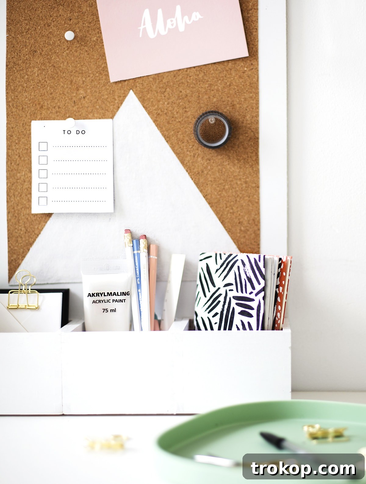 Craft Your Custom Desk Organizer 4 A chic DIY desk organizer with a geometric cork board design, showcasing organized stationery and modern office essentials.