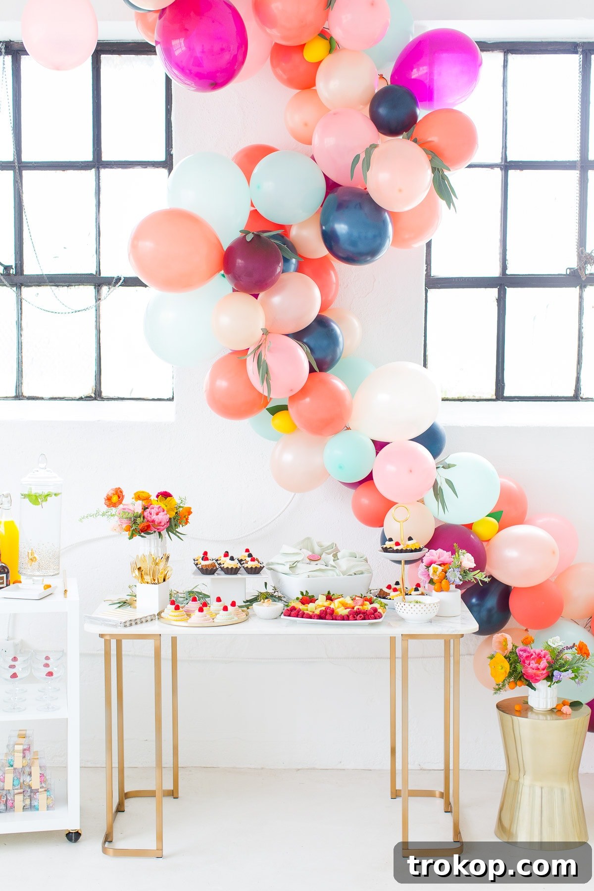 A refreshing mimosa bar with watermelon and orange juices for a bridal shower.