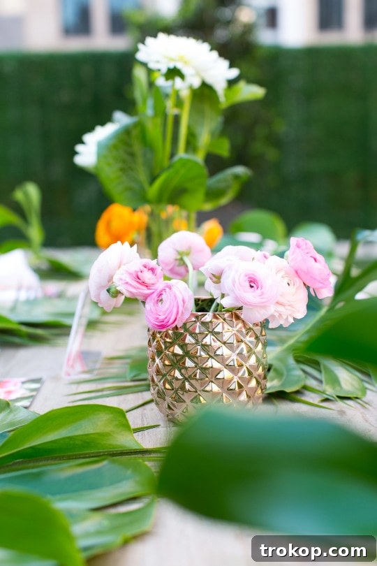 Overhead shot of a beautifully decorated table with flowers and drinks