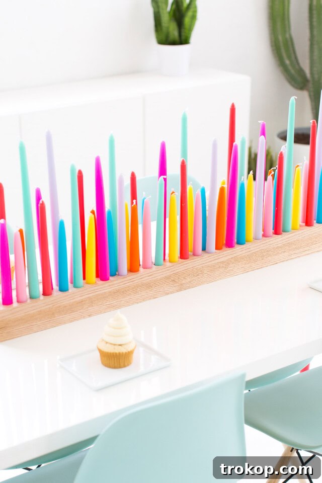 Photo of how to make a Rainbow DIY Taper Candle Holder by top Houston lifestyle blogger Ashley Rose of Sugar & Cloth