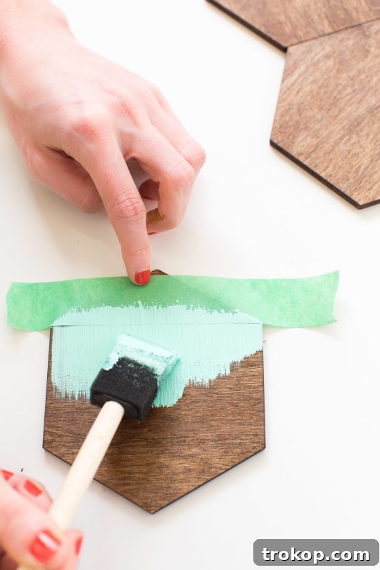 Craft Your Own Petite Wood Platters 4 Step 1: Staining the wooden hexagons with a foam brush