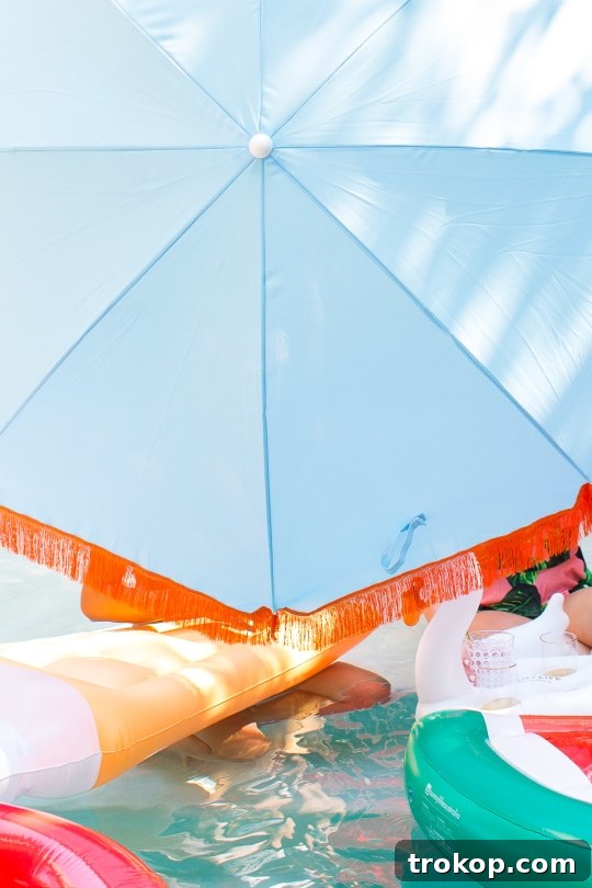 Create a Retro Coastal Sunshade 7 The cutest DIY retro beach umbrella for under $100 by Sugar and Cloth! - houston blogger - summer