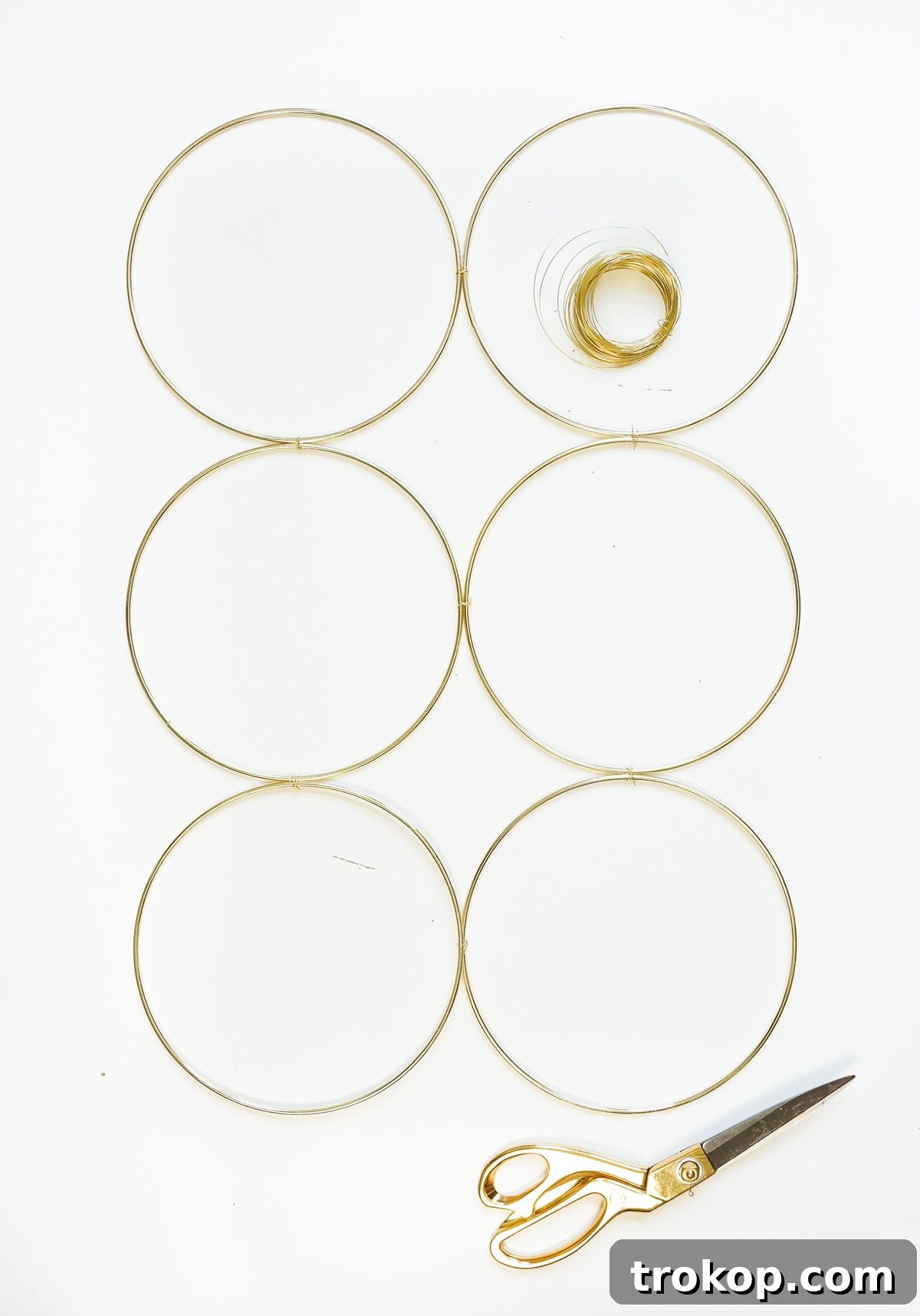 A simple and sophisticated DIY brass ring wall decor to hang at home! - sugar and cloth