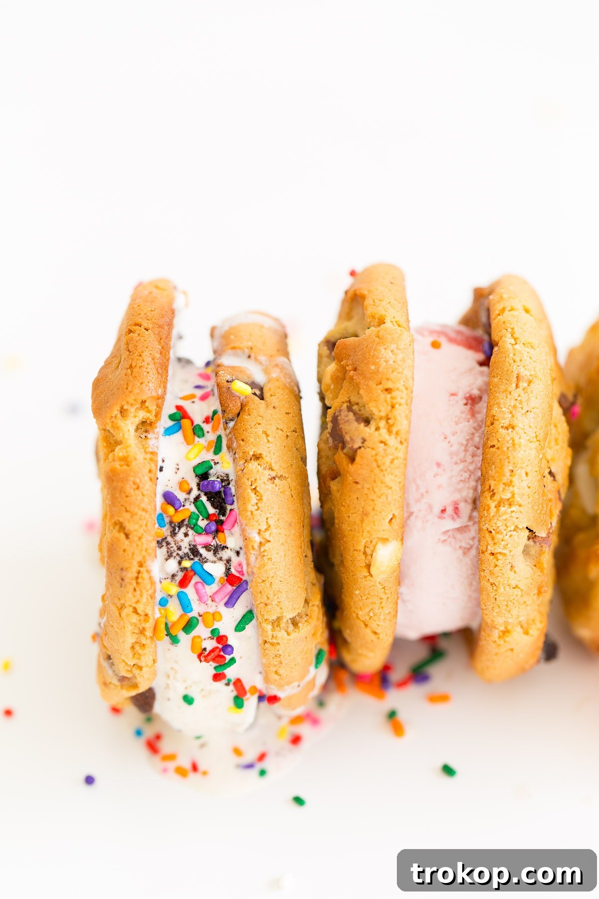 Three decadent Baskin-Robbins warm cookie ice cream sandwiches stacked, ready to be enjoyed with friends.