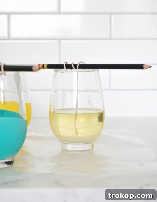 Craft Colorful Citronella Candles with a Balloon Dip Design 8 DIY BALLOON DIPPED CITRONELLA CANDLES - sugar and cloth